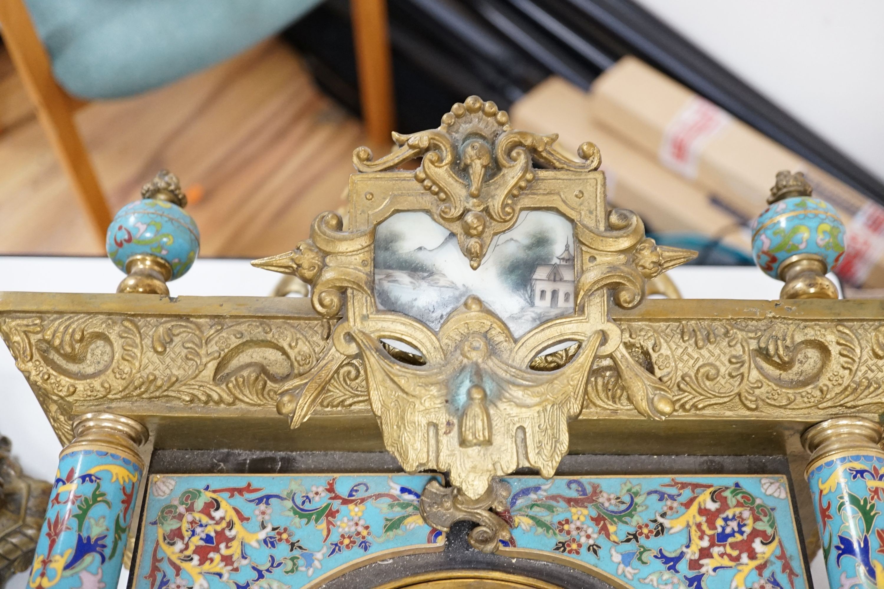 A Chinese cloisonné enamel and gilt metal wall clock, 107cm